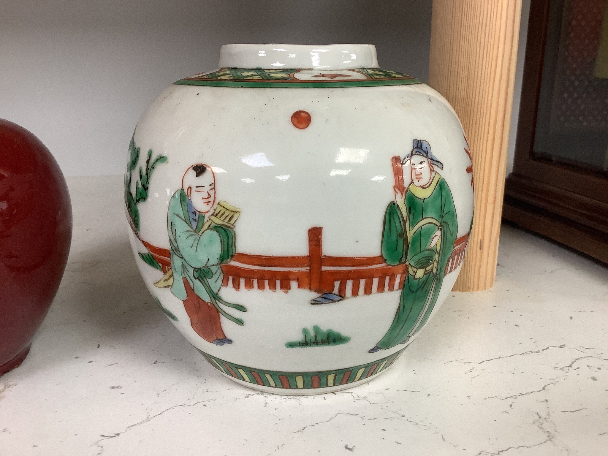 A Chinese famille verte jar and a sang de boeuf vase